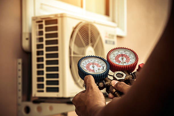 Professional Air Conditioning Service technician working in Waconia, MN